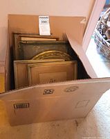 Box showing multiple gilt wood frames