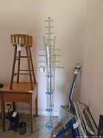 Rack fully extended showing multiple horizontal arms