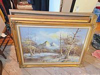Framed oil painting showing full composition and ornate gold frame