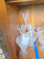 Group of Waterford stemware positioned in cabinet