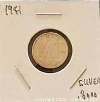 Reverse side showing Bluenose schooner and date 1941