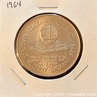 Obverse view of medallion in holder showing Canadian Centennial Numismatic Park design and date