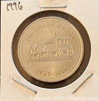 Obverse view showing omnibus design and date