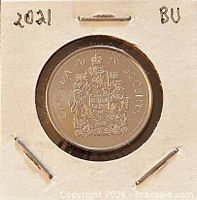 Coin in holder showing reverse with Canadian Coat of Arms