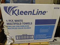 Front of damaged KleenLine box showing product details