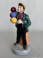 Front view of Royal Doulton Balloon Boy figurine