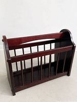 Rack empty, front angle shows slatted construction and finish