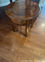 Top and legs of round end table