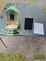 Bird feeder camera unit, solar panel, manual, screws