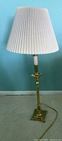 Full view of lamp with shade upright