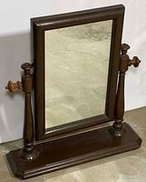 Full front view of rectangular tabletop mirror