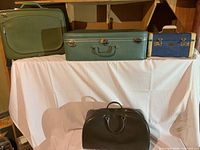 Group shot of all four luggage pieces