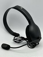 Full view of headset showing headband, boom mic, cable and 3.5 mm plug