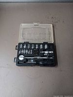 Closed clear-lid case showing contents outline
