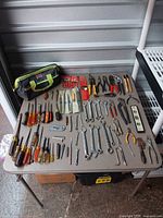 Full layout of all tools and bag on table