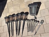 Lot overview showing all solar lights and bug zapper