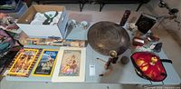 Overall view of all décor, textiles, magazines and prints on table