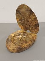 Box closed showing top burl grain