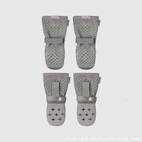 Front view of four grey mesh dog booties