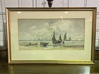 Front view of framed watercolor seascape with boats