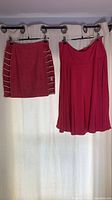 Front view of both pink skirts hanging