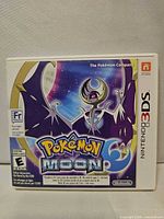 Front of Pokémon Moon Nintendo 3DS case showing cover art