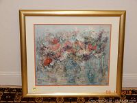 Framed floral print by Hibel titled "Flowers" showing the artwork in its entirety with the gold frame and mats visible.