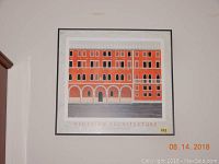 Framed print of Venetian Architecture by Dawson hanging on wall showing the print's colors, and signature number.