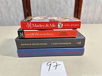 Stack of all four book spines