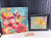 Front view of both art pieces showing designs and relative sizes