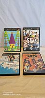 Group shot of all four PS2 games showing front covers