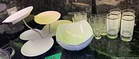 Overall view of tiered stand, bowls, and assorted glasses