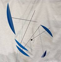 Full view of mobile showing blue wing elements and rods