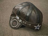 Full view of signed leather Dallas Cowboys helmet