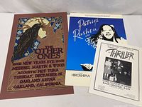 All three posters laid out showing overall condition and design