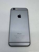 Rear view of space gray Apple iPhone 6 showing back casing and camera