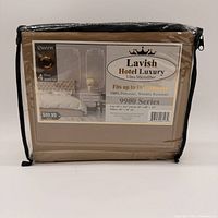 Front view of sealed Lavish Hotel Luxury queen sheet set in carry case