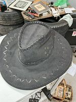 Top view showing whipstitch brim and braided crown edge