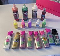 All 17 bottles grouped showing sizes and colours