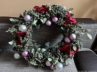 Full view of wreath on sofa showing overall design and components