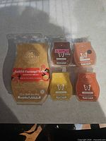 Front view of Scentsy Salted Caramel Toffee brick and four wax bars
