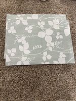 Two stacked rectangular placemats showing full pattern