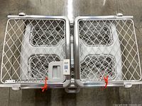 Top view of Diggs collapsible dog crate opened flat showing mesh panels and latches