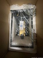 Wall lantern inside original packaging