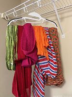 All seven fabric pieces hanging on hanger