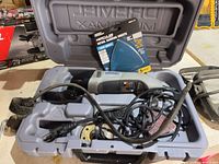 Tool, power cord, accessories and sanding sheet pack inside case