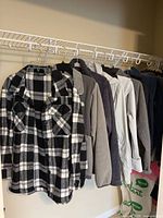 Full row of outerwear pieces on hanger