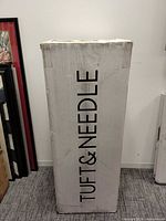 Front of sealed Tuft & Needle mattress box