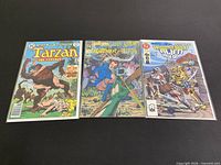 Group shot of all three bagged comics