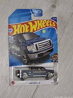Front view of blister-carded Hot Wheels 2009 Ford F-150 Goodyear edition